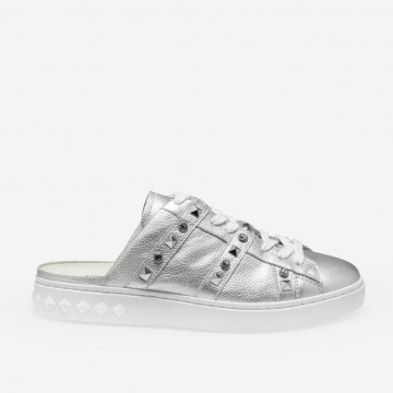 Silver PARTY backless sneakers with studs and rhinestones.
