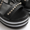 Wedge sandals in black leather with strass
