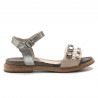 Sandals in taupe leather with studs and gems