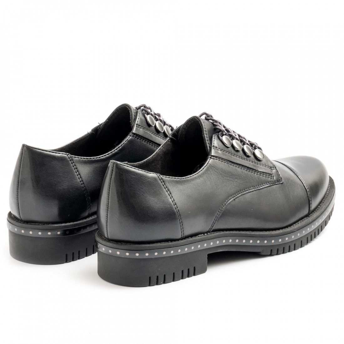 Black leather Tamaris slip on with chains and studs