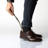 Antiker Schuhanzieher aus Messing mit Steigbügelgriff