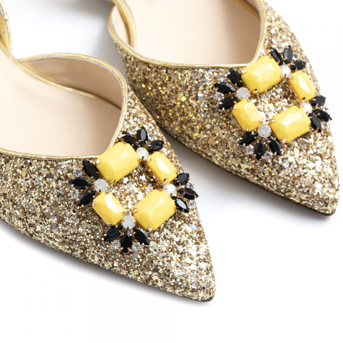 Prosperine slingback platte schoen in gouden glitter met gele stenen