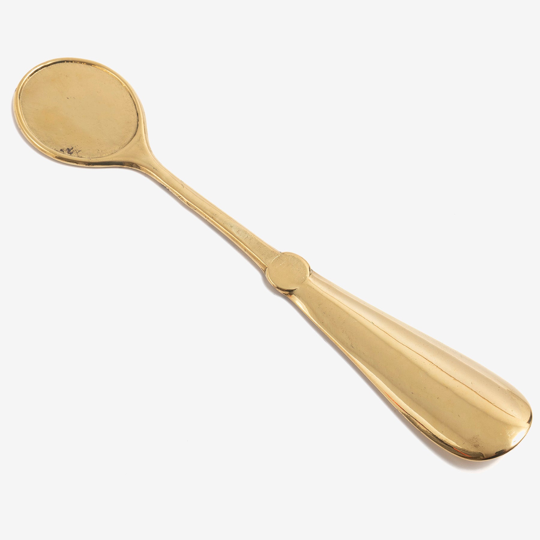 Brass shoehorn racket