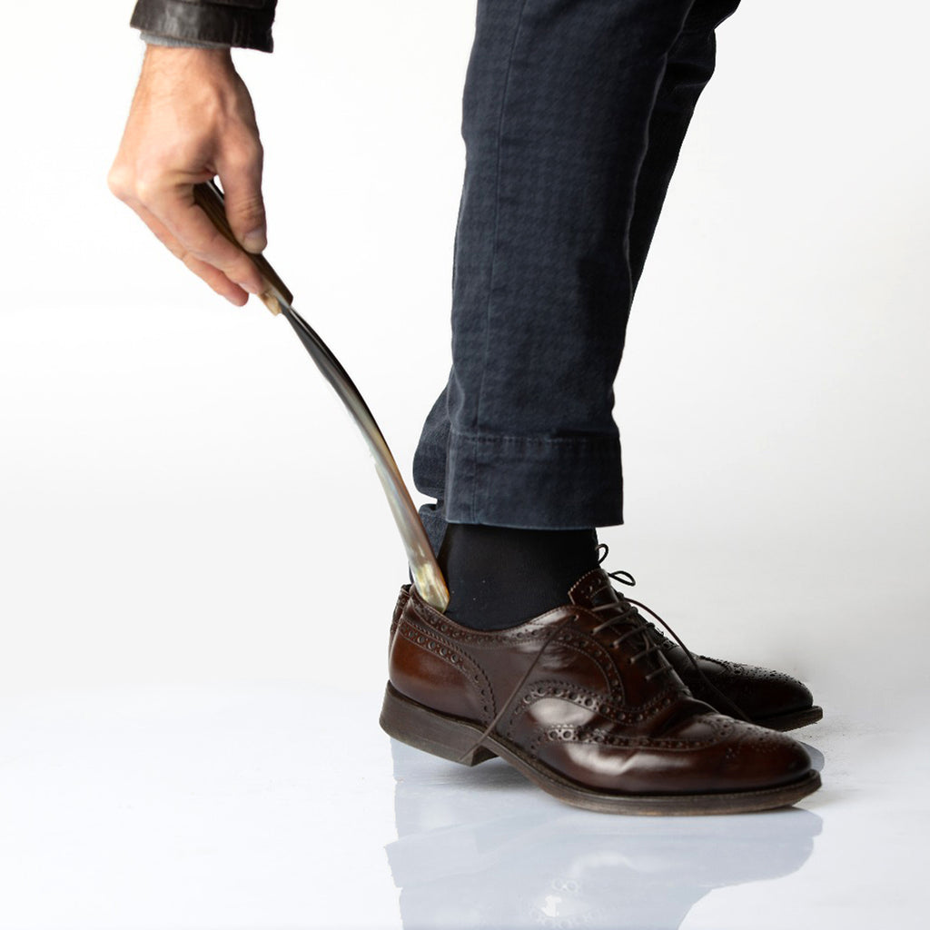 Brass shoehorn racket