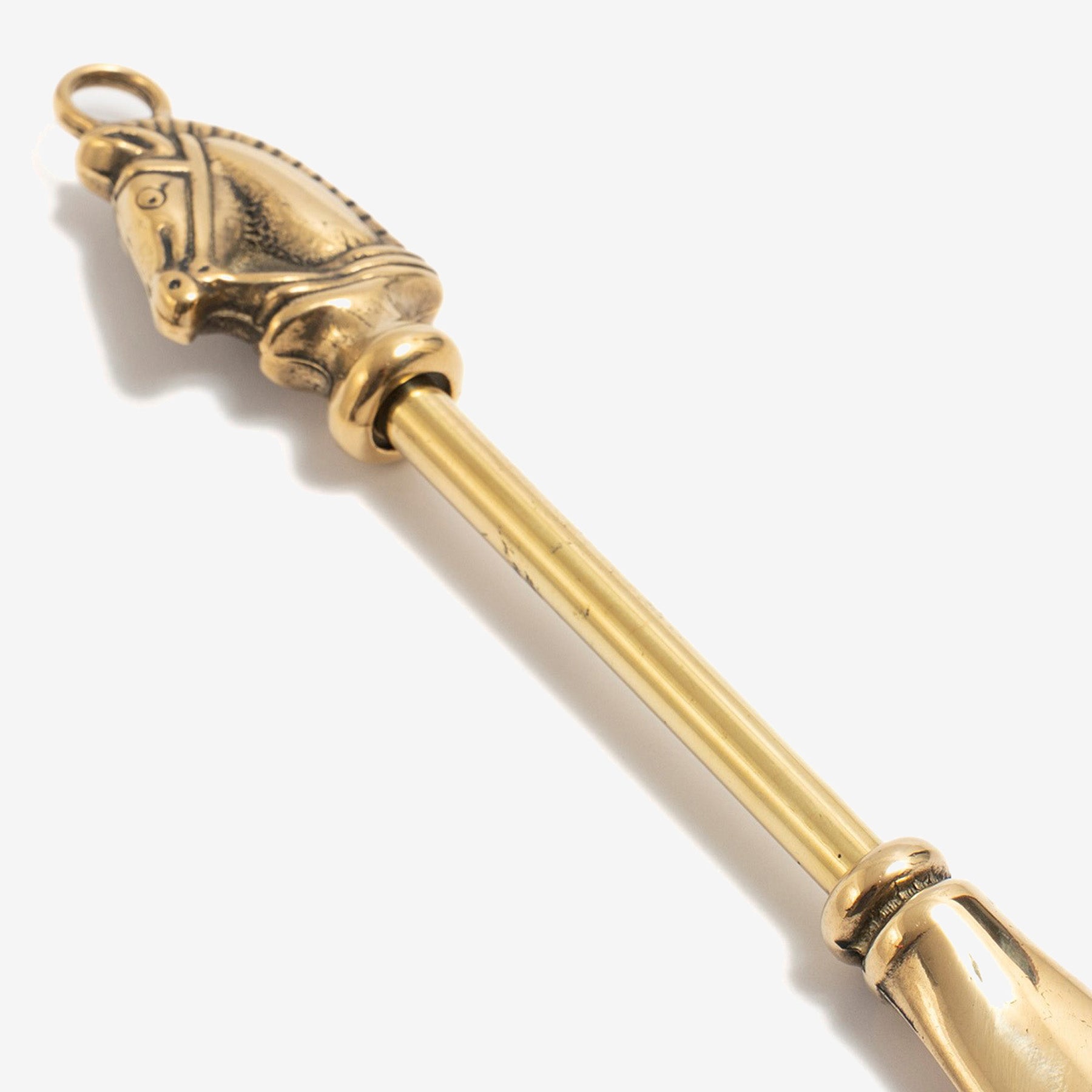 Brass shoehorn horse