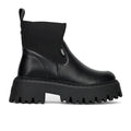 BUFFALO: Dames chelsea boot Aspen in zwart kunstleer met gebreide sok en grof geribbelde maxi-zool